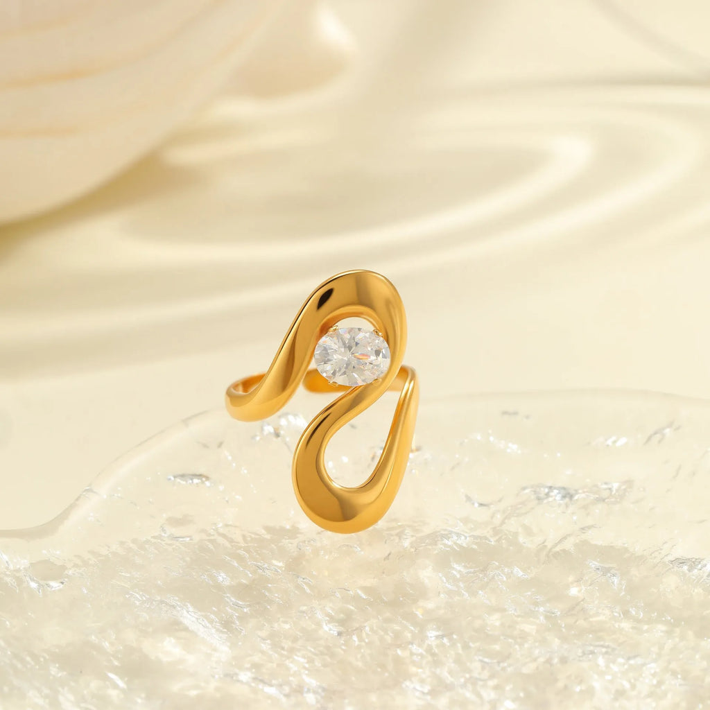 Geometric open mouth zircon ring made from stainless steel, showing its free size design.