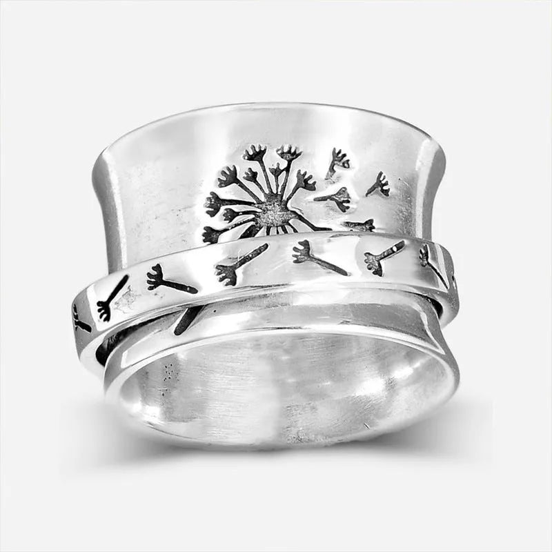 Silver electroplated alloy flower ring with rotatable design on finger