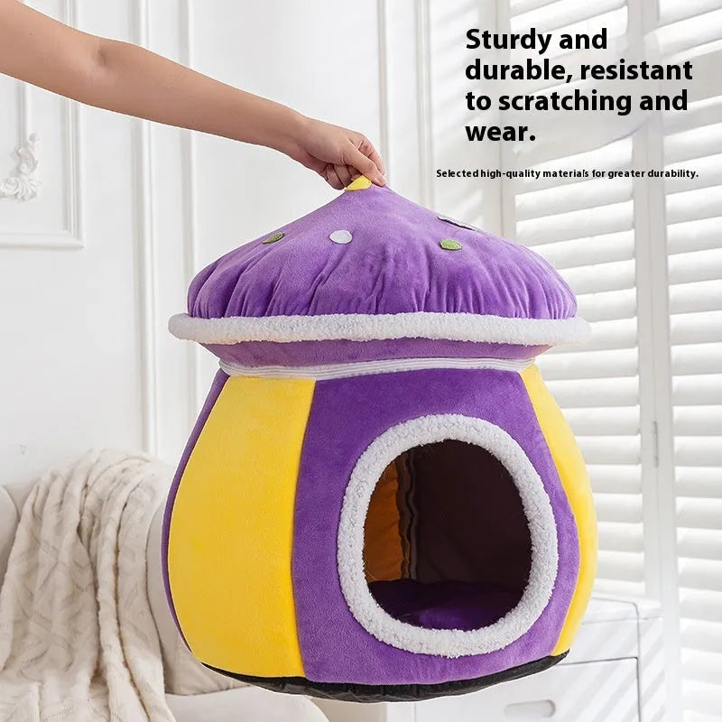 Purple mushroom-shaped cat nest bed with soft plush material and a separate blanket.