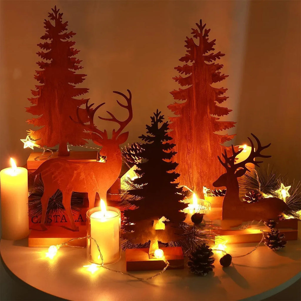 Three metal Christmas tree decorations with elk antlers in rustic finish
