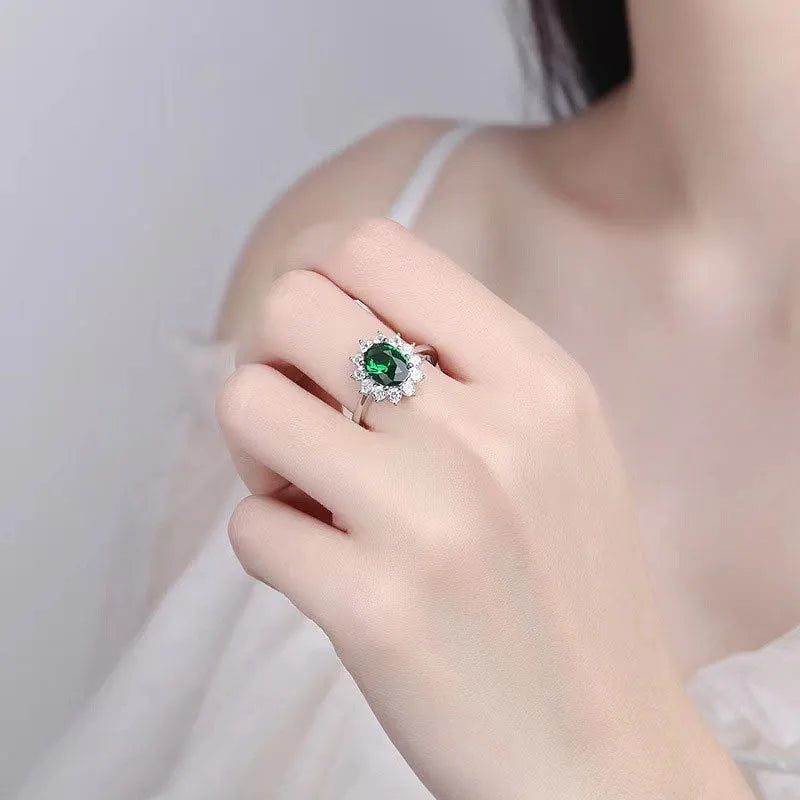 Blue moissanite flower-shaped copper ring for women on a ring size chart showing sizes 6 to 10.