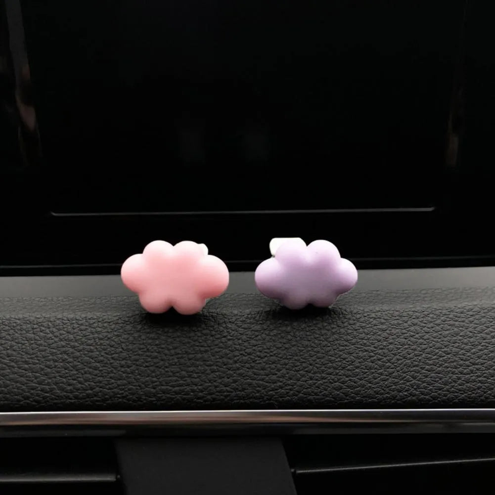 Resin Baiyun cartoon car fragrance clip in light green colour attached to car air vent