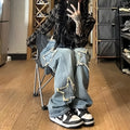 Blue high-waist women's jeans with a wide-leg straight cut on a mannequin.