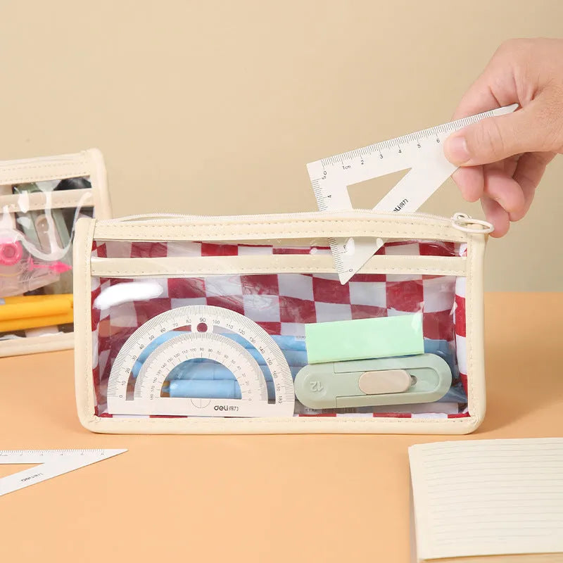 Transparent PVC pencil case with chessboard pattern showing writing instruments inside
