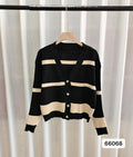Women's black and white 3D striped knitted cardigan with button front and V-neck on a slim fit.