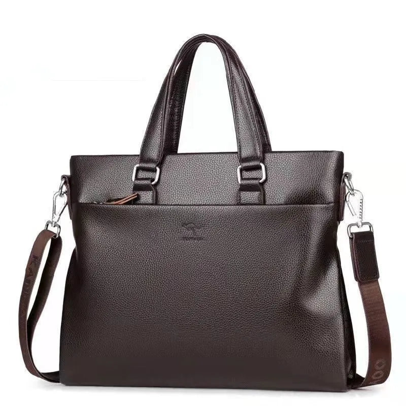 Men's black PU leather crossbody messenger bag with splicing design, shown next to a tablet for scale.