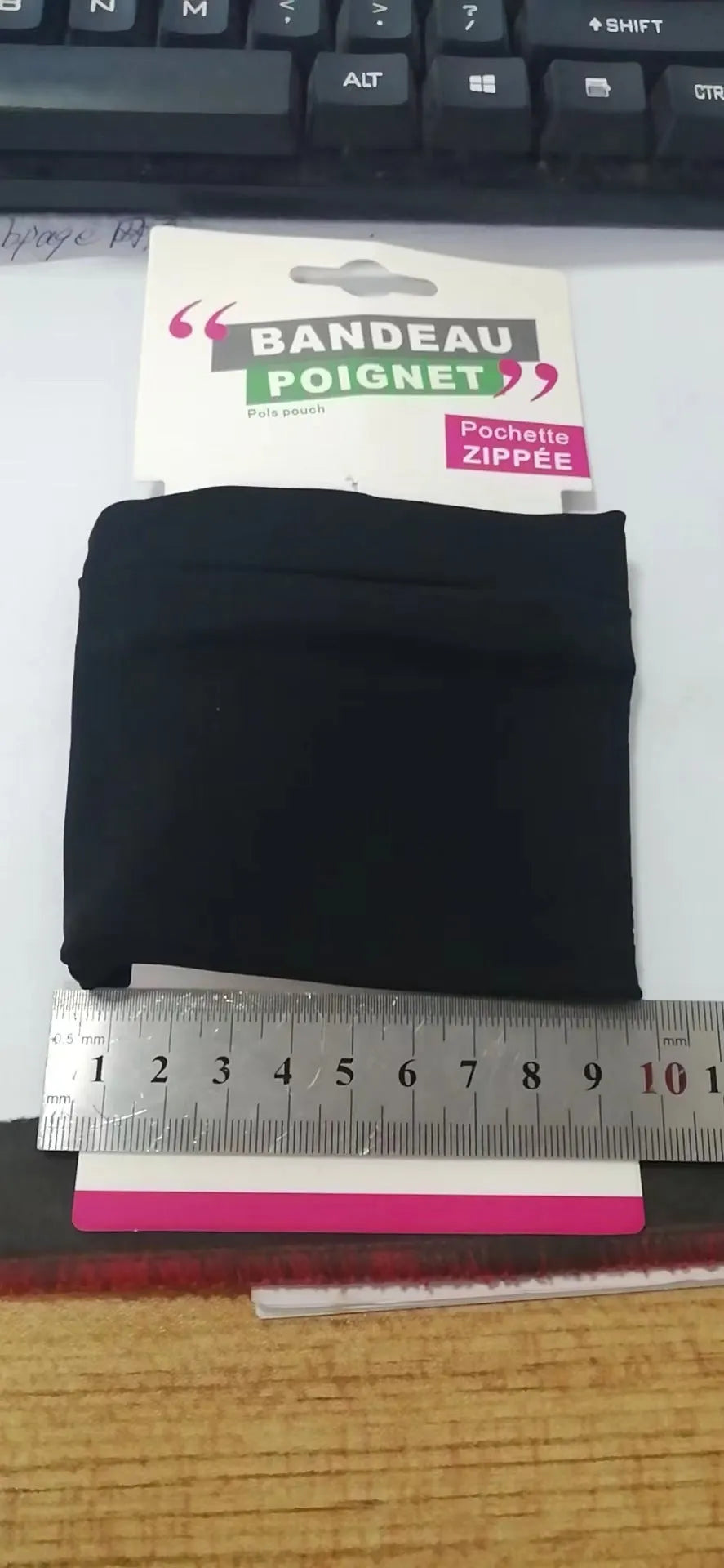 Wrist bag armband sleeve showing 10 x 10.5 cm dimensions for mobile phone storage