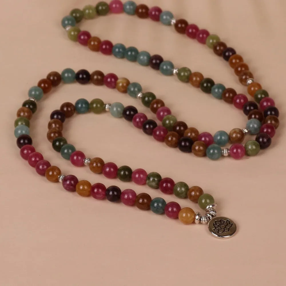 Tourmaline coloured 108-bead alloy bracelet with multi-layer lotus hanging design on adjustable string.