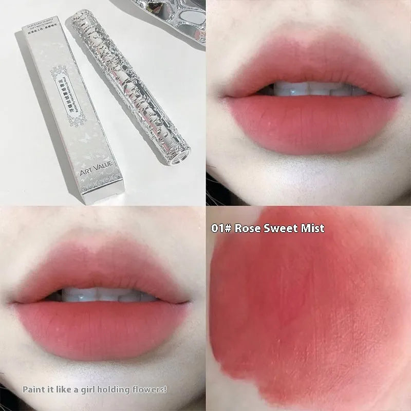 Velvet Mist Lip Mud matte white tube with six shade swatches: rose sweet mist, rock candy persimmon, oats cow's milk, sweet stained strawberries, spring cherry blossoms, cinnamon tea brown