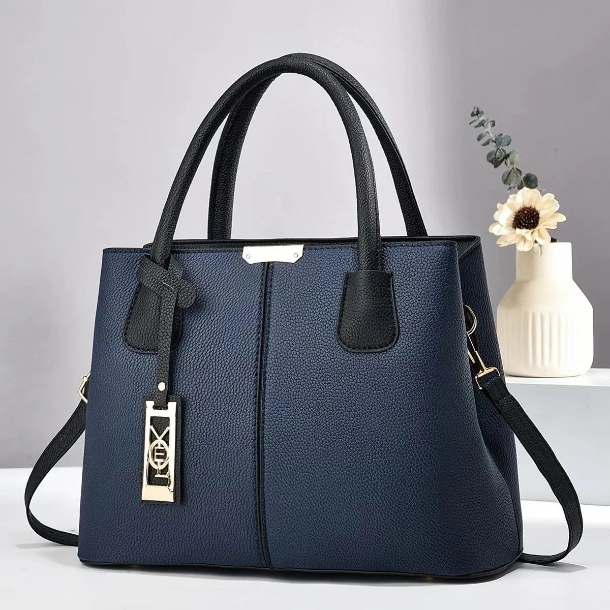 Soft PU large capacity shoulder bag in horizontal square shape with leather strap