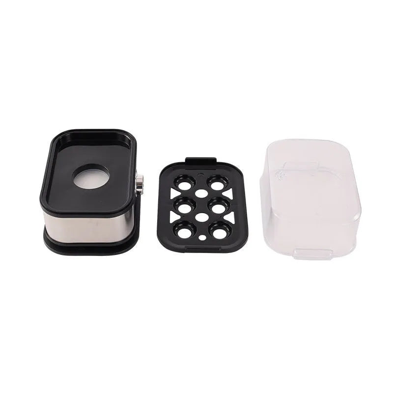 Black portable stainless steel mini egg boiler with power cord and plug adaptors for travel