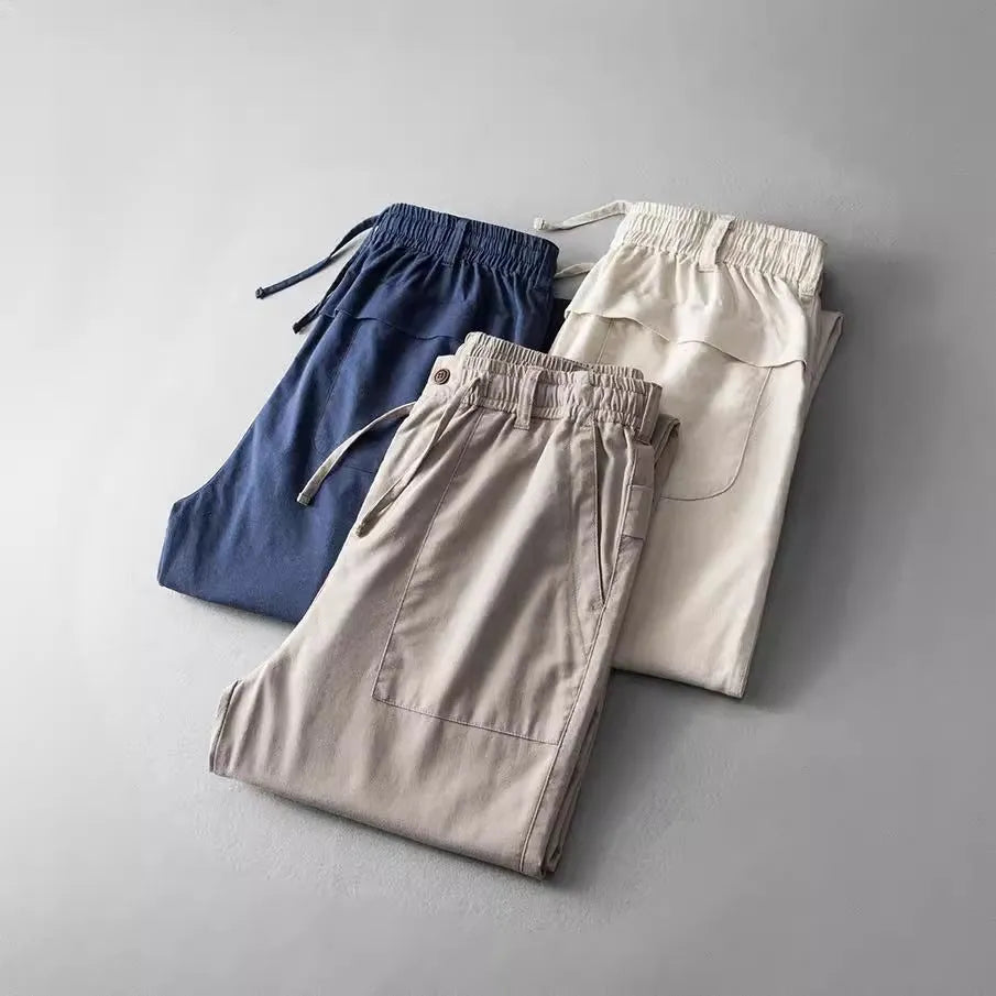 Men's linen casual trousers in solid colour with mid-waist styling and full length
