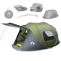 Dark green automatic pop-up two-person camping tent with dome shape shown set up in outdoor environment
