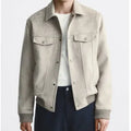 Light Grey suede velvet long sleeve jacket with a casual British-style fit on a hanger.