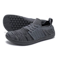Men's casual walking shoes with synthetic leather upper, mesh panels, wide toe box, and lace-up closure