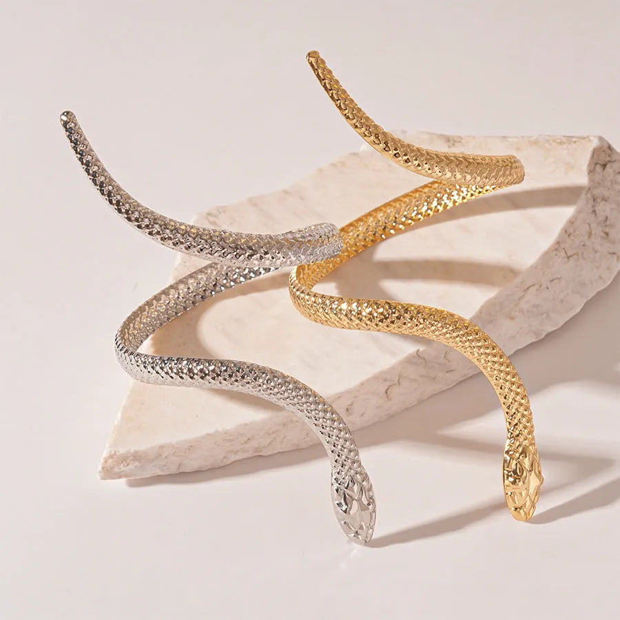 Gold metal ring and bracelet set with exaggerated twisted winding design and simulated snake opening details