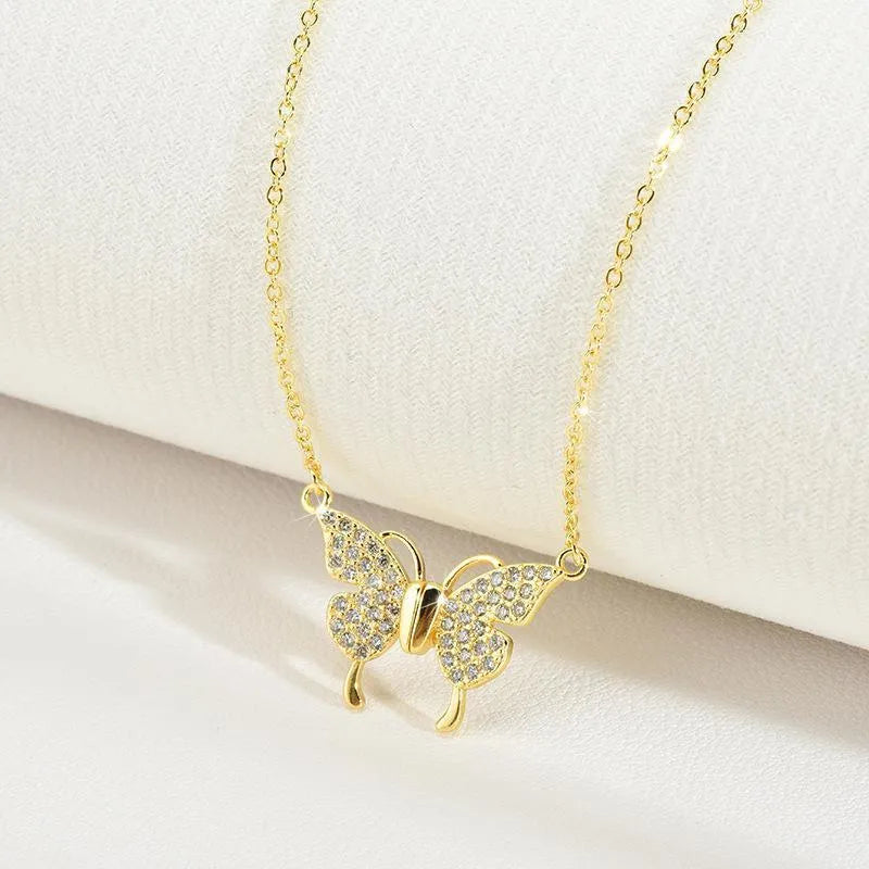 Gold titanium steel clavicle necklace with magnetic butterfly clasp and twisted chain