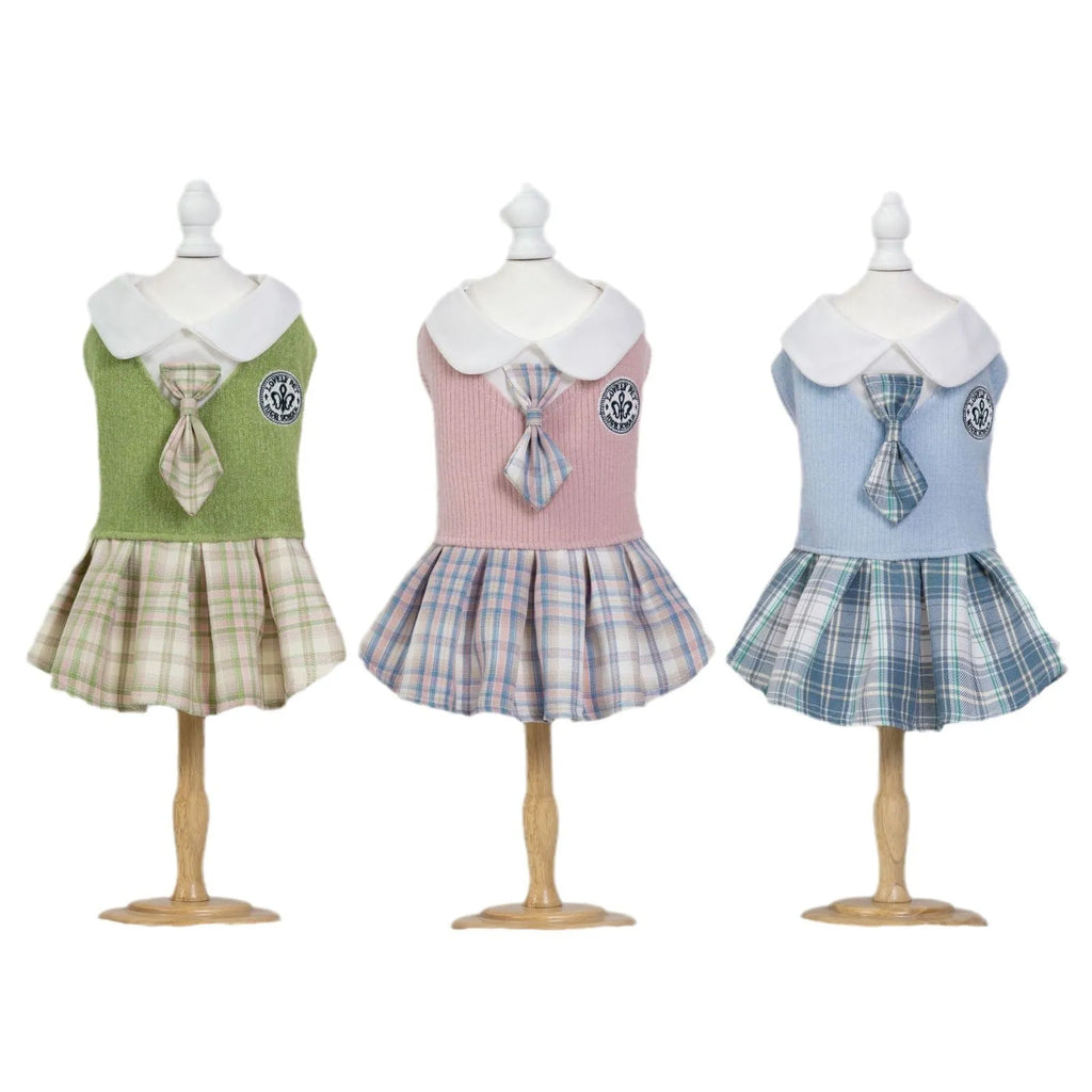 A pink tartan skirt with princess styling for a small dog mannequin.