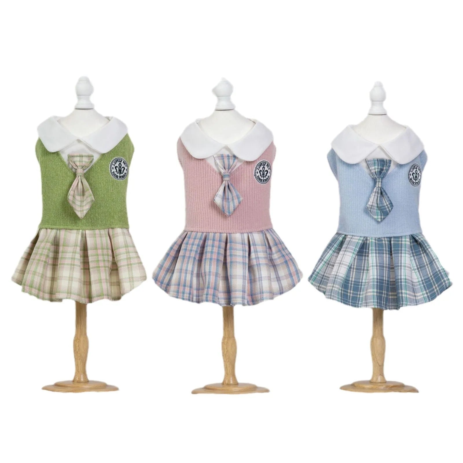 A pink tartan skirt with princess styling for a small dog mannequin.