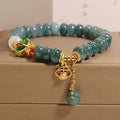 Blue water jade abacus beads crystal bracelet with white agate and butterfly motif on alloy base