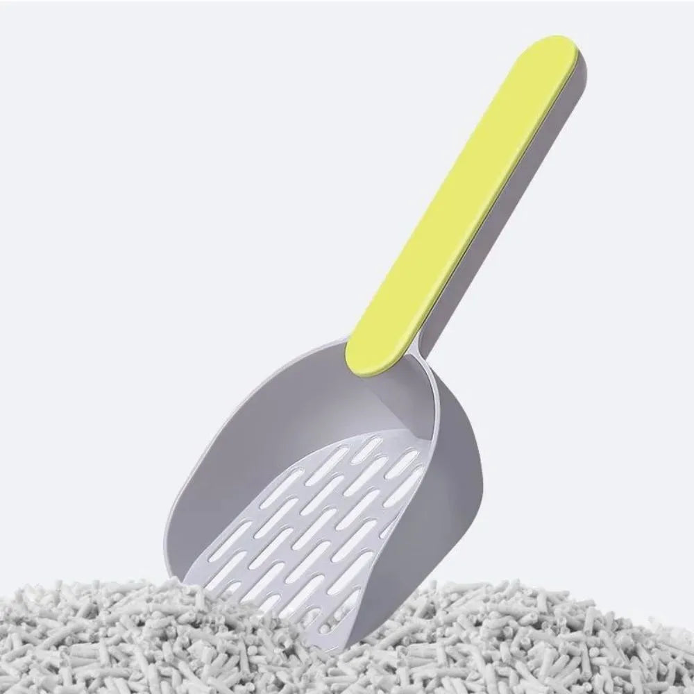 Plastic cat litter shovel in blue, green, and pink 26.6cm long for cleaning litter boxes