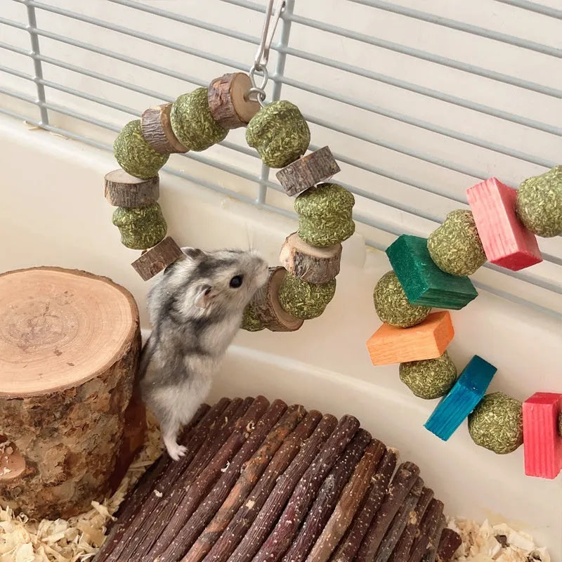 Hamster chew toy with decorative straw ball ring and Applewood gnawing rod for small pets