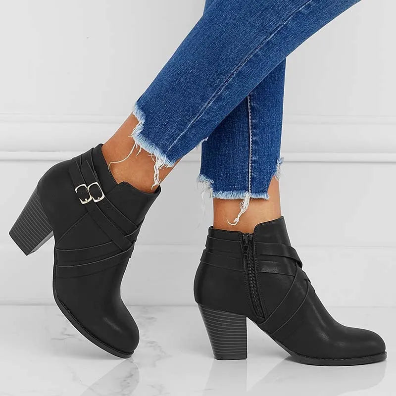 Plus size black short boots with side zip, buckle detail, and a 7cm thick heel.