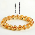 Natural yellow citrine bead bracelet showing geometric Asestelle cutting in both single and three-circle configurations