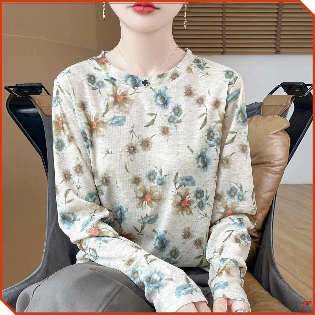 Ladies' round neck pullover shirt with floral printed design in Tencel cotton knit fabric.