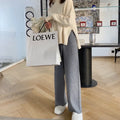 Women's high waist knitted wide-leg trousers in cream white colour with elastic waistband