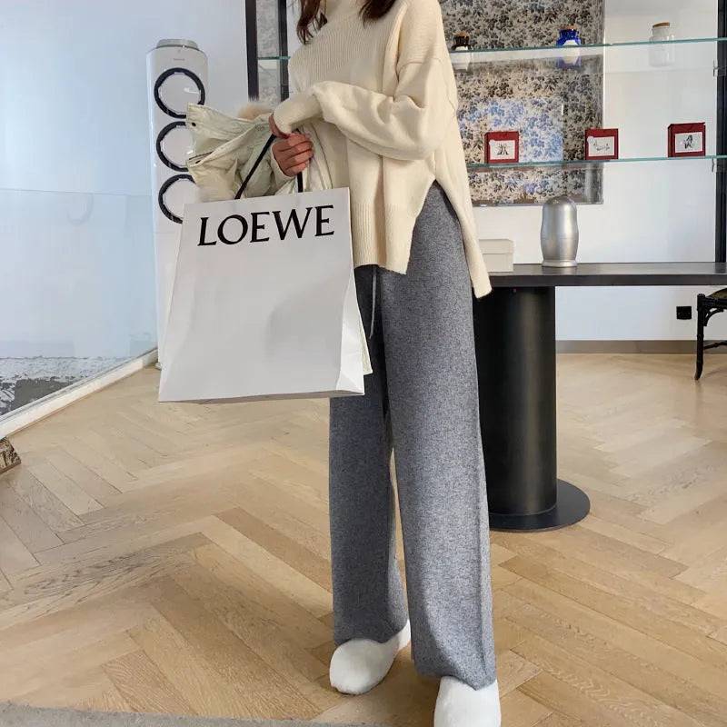 Women's high waist knitted wide-leg trousers in cream white colour with elastic waistband