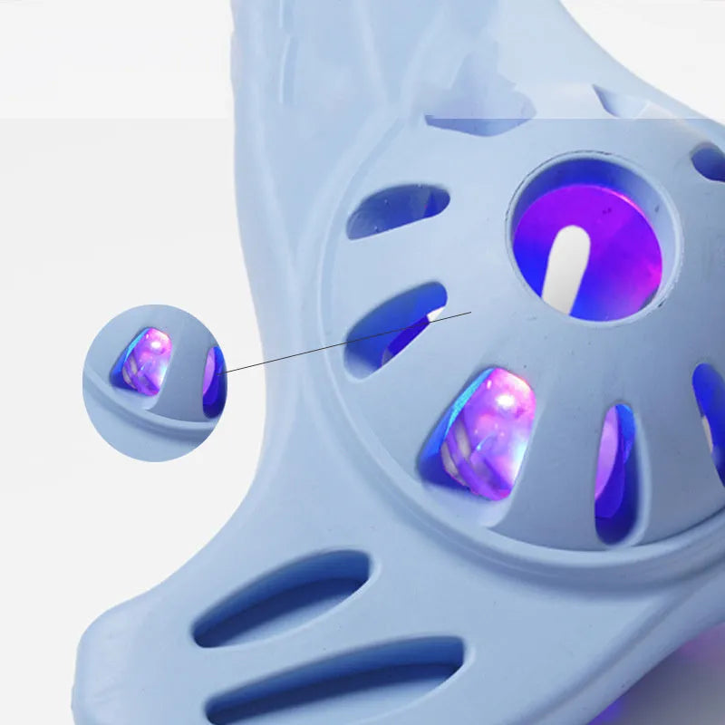 Blue or purple boomerang-shaped bite-resistant chew toy for medium and large dogs.