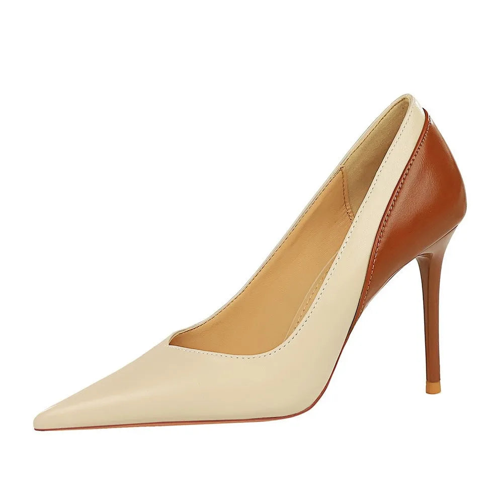 Women's stiletto heel pumps in colour block design with pointed toe and high heel for banquets