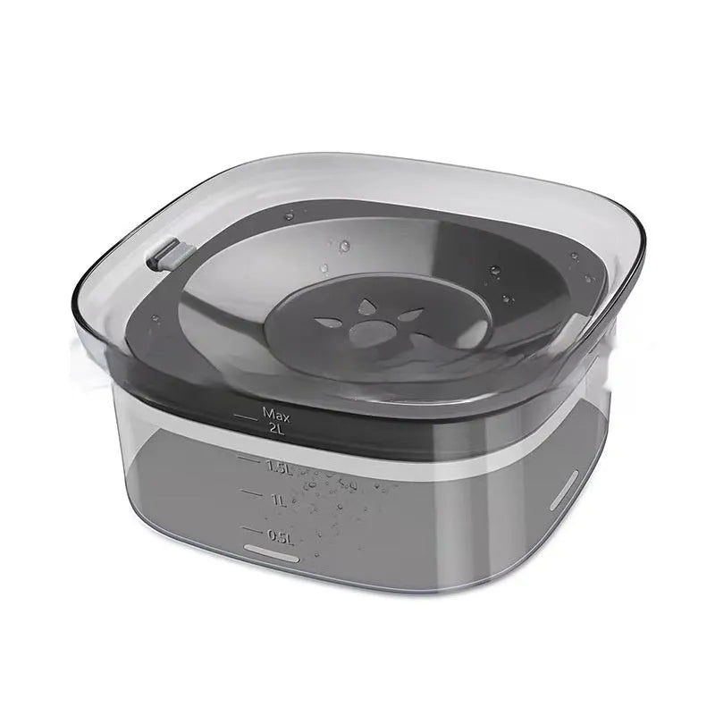 Transparent 70oz/2L dog water bowl with visible water level and floating disk