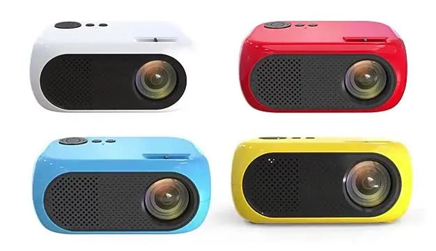 Compact gold and white M24 micro mini LED projector on a table with power adapter and AV cable.
