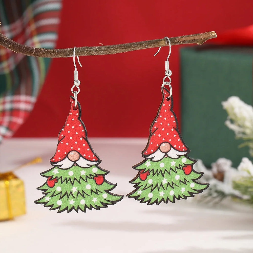 Women's wooden Christmas earrings showing Christmas tree and water drop snowman designs with Santa Claus elements