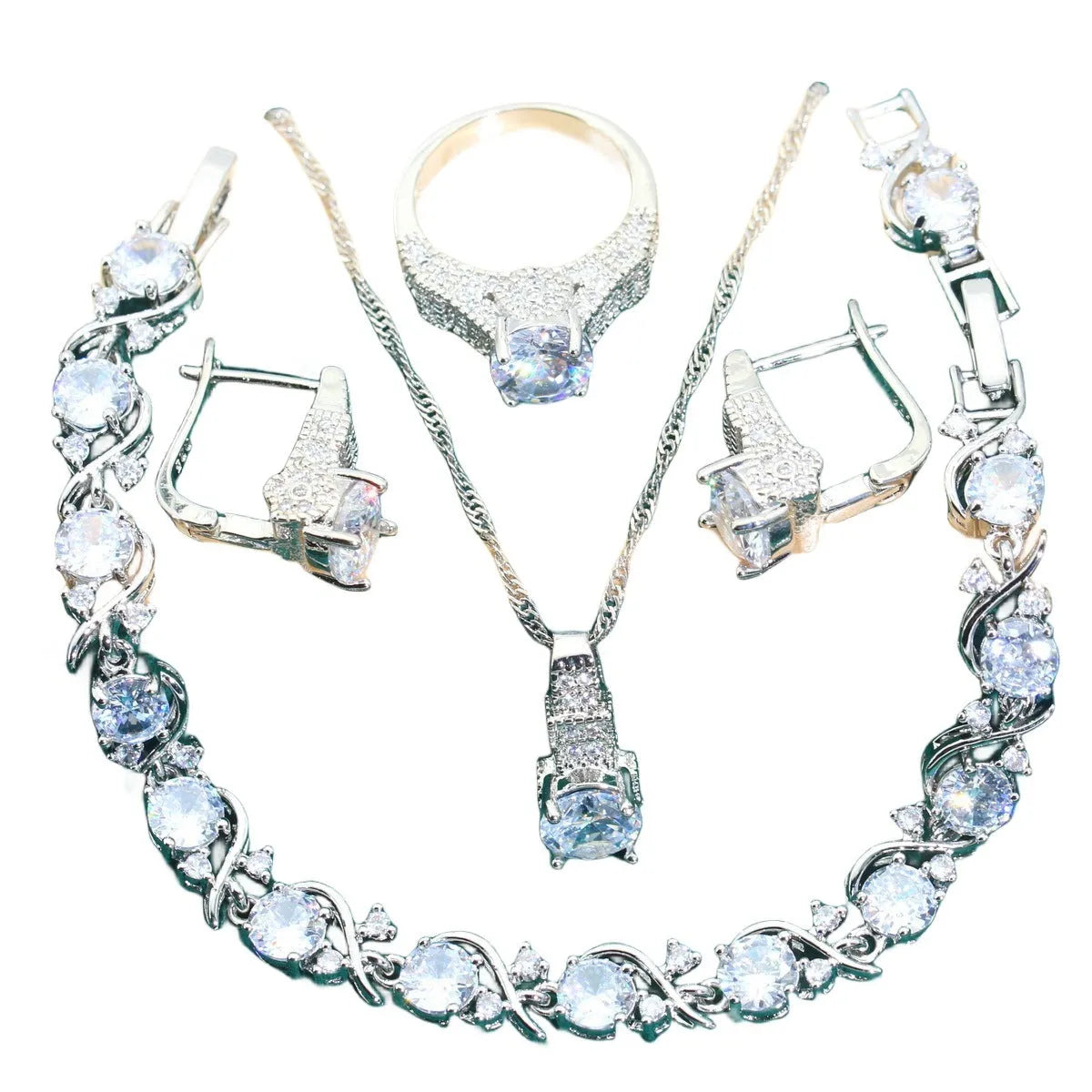Bridal zircon jewellery four-piece set showing necklace, bracelet, earrings, and ring with water wave chain