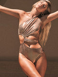 Women's gold backless one-piece swimsuit with sleeveless design