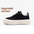 Raised bottom canvas shoes for men in black with breathable mesh lining and platform sole