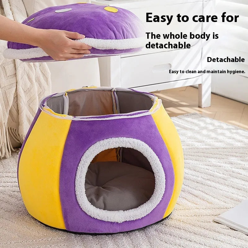 Purple mushroom-shaped cat nest bed with soft plush material and a separate blanket.