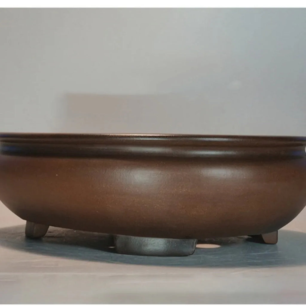 Handmade classical purple sand clay desktop flowerpot measuring 58cm wide.