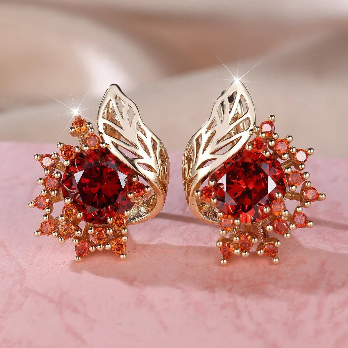 Round floral feather earrings with zircon stone centre in champagne gold finish, available in six coloured diamond options