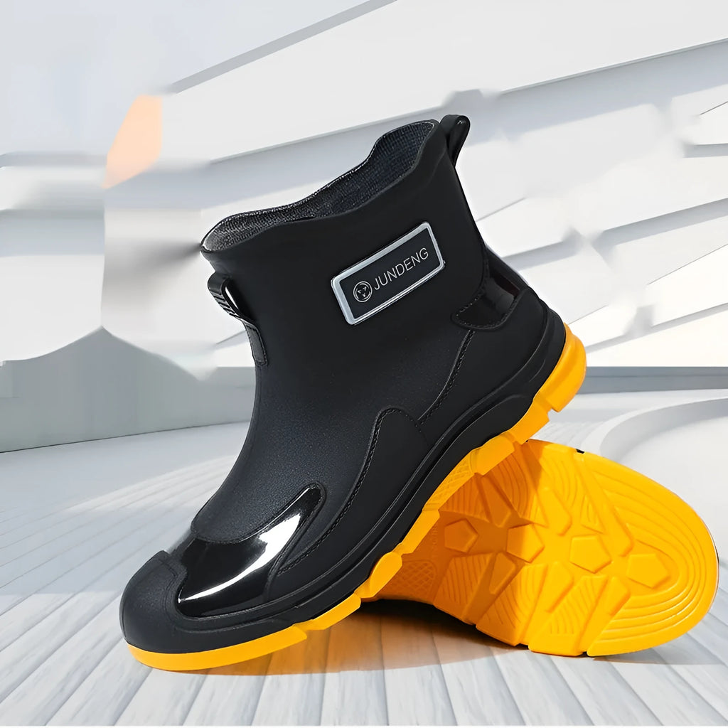 Solid colour low tube PVC rain boots with flat heel and round toe, integrated moulding sole, available in black, black and yellow, khaki