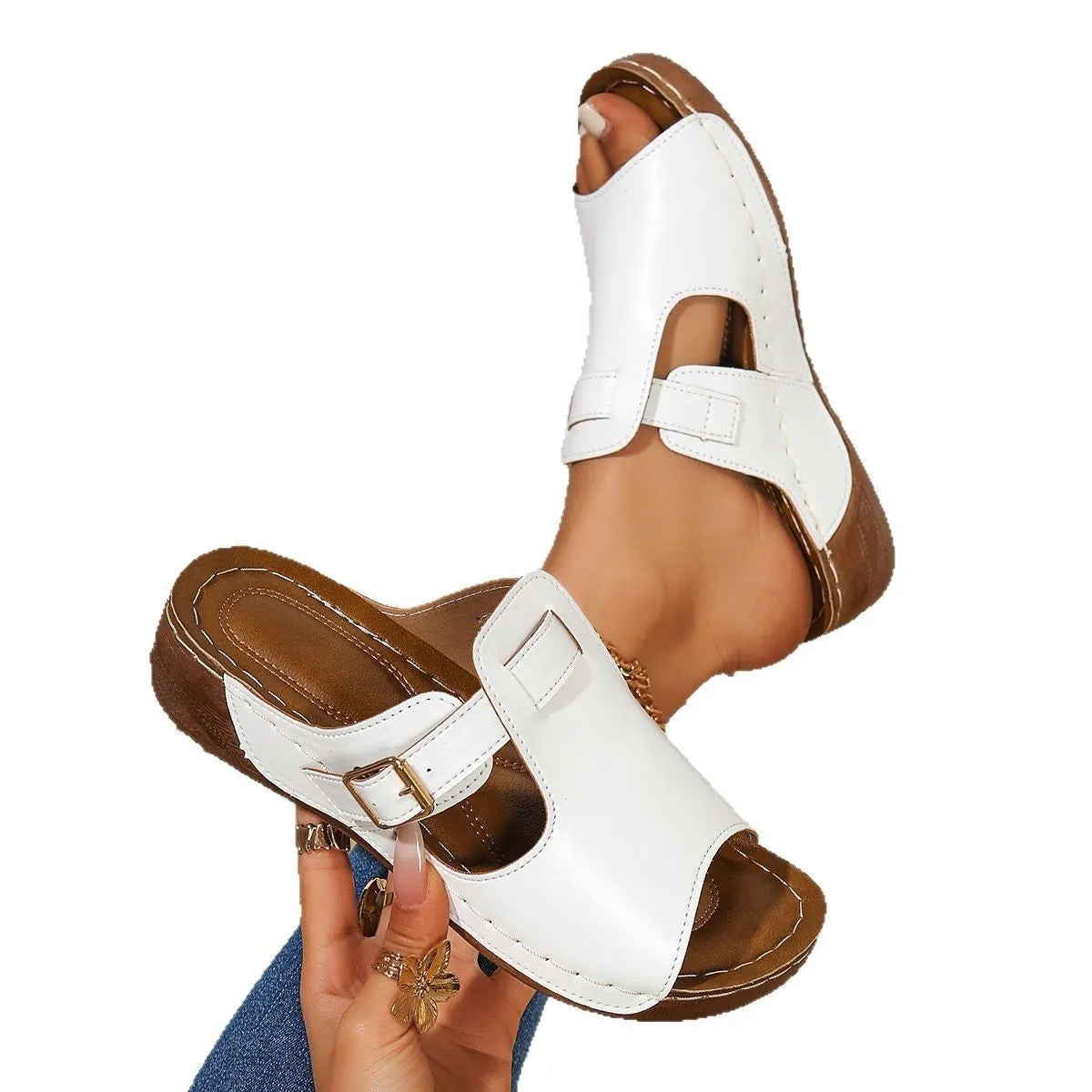 Women's white fish mouth toe slip-on sandals with a PU upper and EVA sole on a plain background.