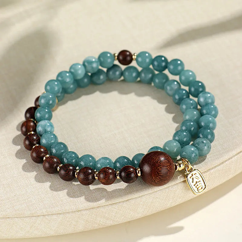 Blue gold sandalwood beaded bracelet for women with fu character charm electroplated finish