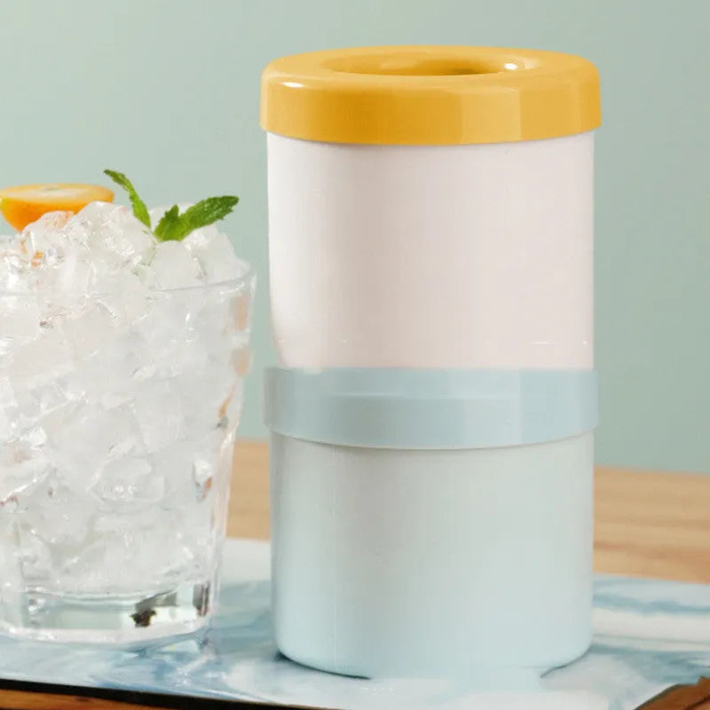 Portable 2-in-1 ice bucket mold with lid made of food-grade silicone in blue-green colour