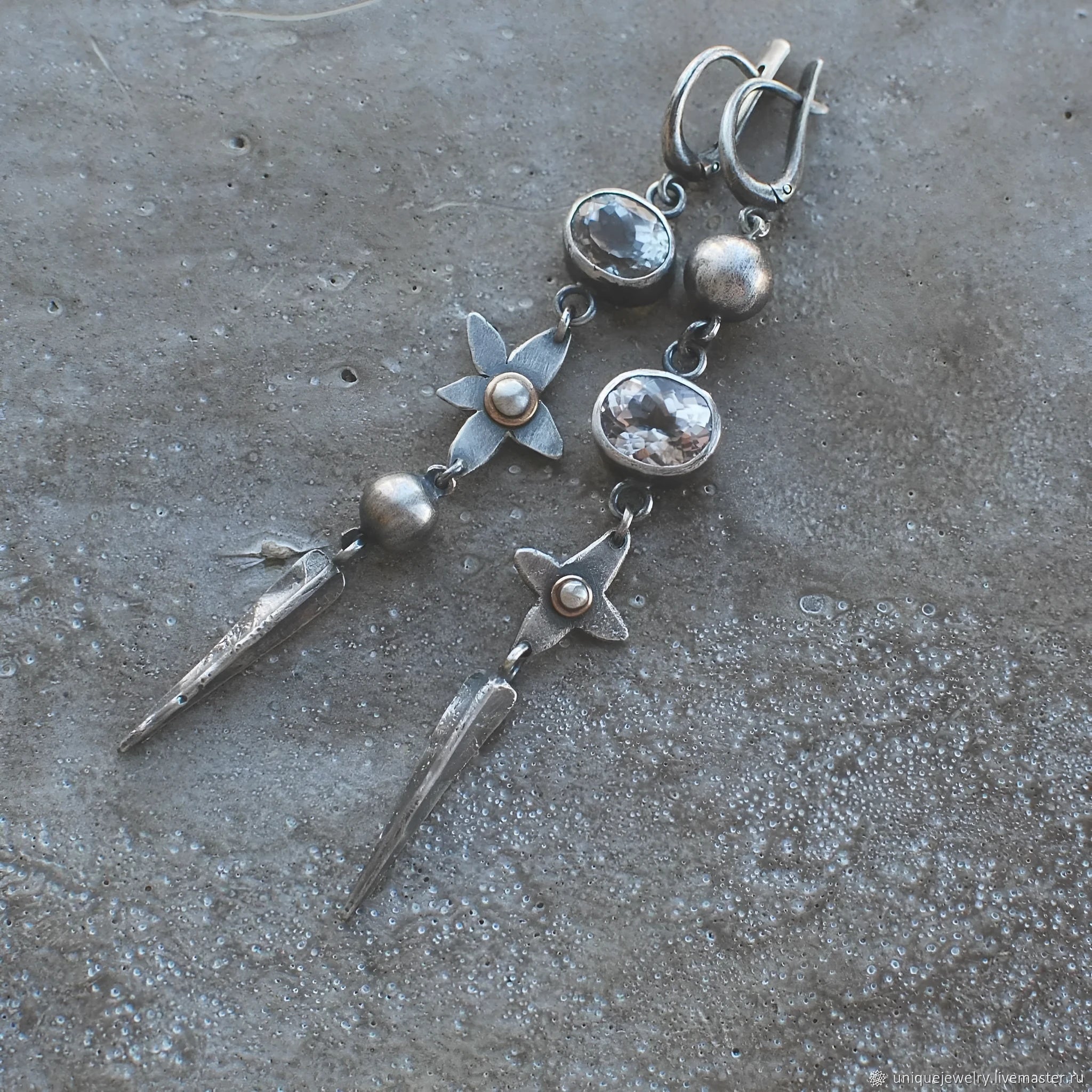 Geometric XINGX pendant earrings with antique silver plating and rhinestone details