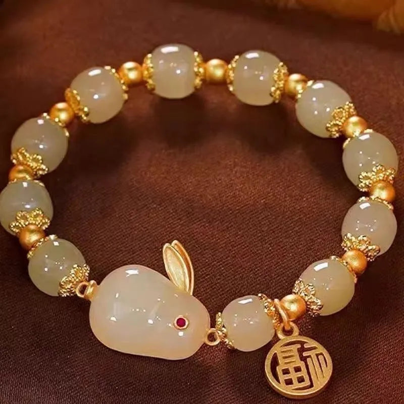 Women's black leather bracelet with green jade hare charm and fu character pendant