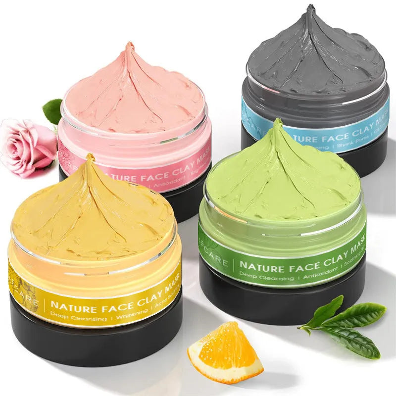 4 pack of clay face masks with Dead Sea mud, green tea, turmeric, and rose clay, each 80ml, on a white background