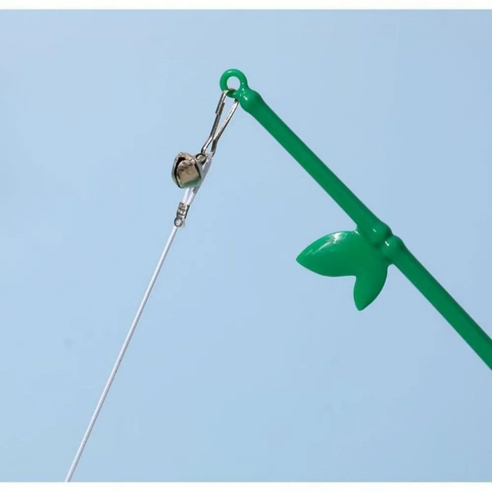 Green interactive cat toy feather wand with bell refills and feathers on a white background
